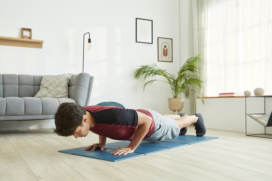 Stand on a board to work the muscles of the press and back